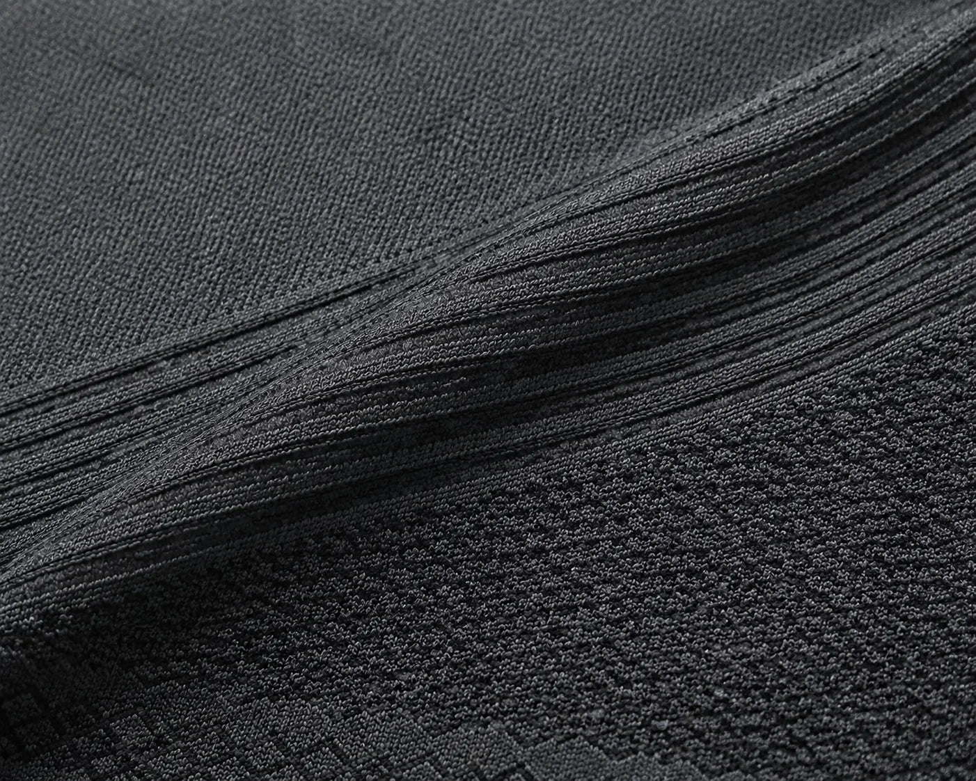 Close-up of the textured nylon and elastane knit